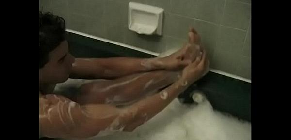  Young lad has a sensual bath then goes to bed to play with his tool
